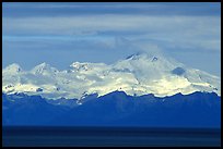 Mt Iliamna, a volcano in Lake Clark National Park, seen across the Cook Inlet. Ninilchik, Alaska, USA ( color)