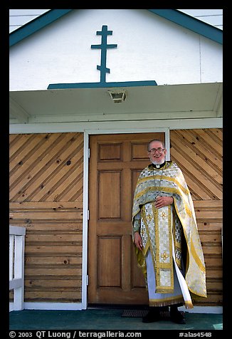 Orthodox priest ouside the old Russian church. Ninilchik, Alaska, USA