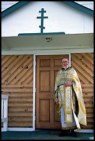 Orthodox priest ouside the old Russian church. Ninilchik, Alaska, USA (color)