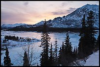 Winter sunset over Nenana River. Alaska, USA