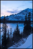 Frozen Nenana River at sunset. Alaska, USA