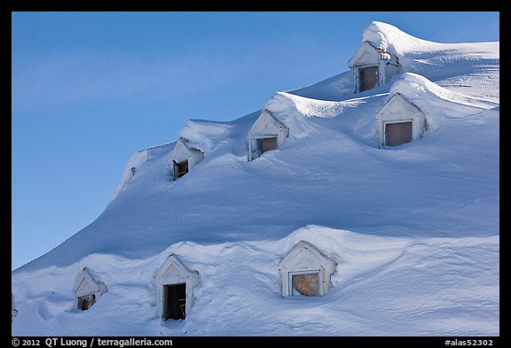 Snow-covered roof with windows. Alaska, USA