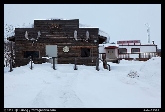 Log cabin and Slate Creek Motel, Coldfoot. Alaska, USA