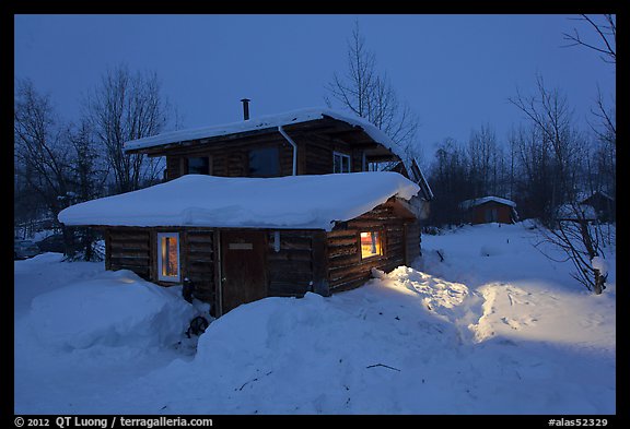 Log cabin at night. Wiseman, Alaska, USA