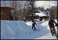 Winter recreation with snow-tired bike and skis. Wiseman, Alaska, USA ( color)