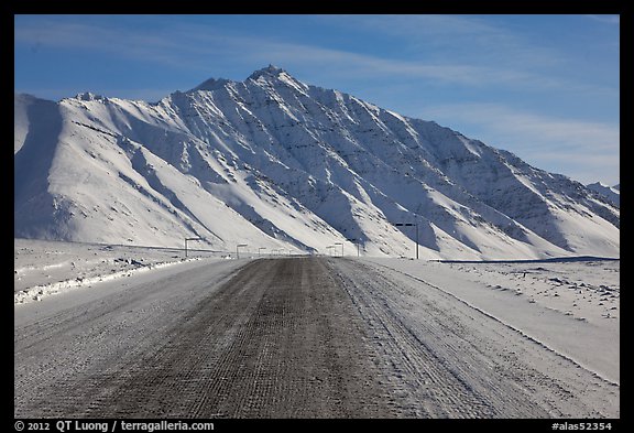 Frozen James Dalton Highway below Arctic Mountains. Alaska, USA