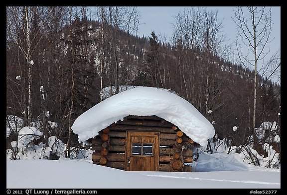 Snow-covered cabin. Wiseman, Alaska, USA (color)