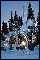 Sun setting over ice sculpture, World Ice Art Championships. Fairbanks, Alaska, USA