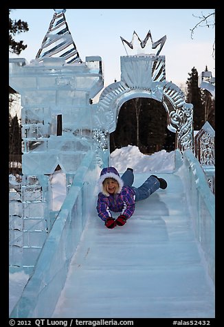 Girl on ice slide, Ice Alaska. Fairbanks, Alaska, USA