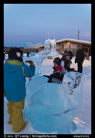 Children playing on ice sculptures, Ice Alaska. Fairbanks, Alaska, USA (color)