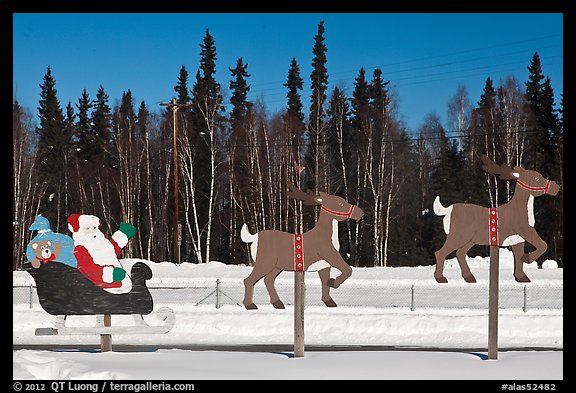Santa Claus and reinder cut-out in winter. North Pole, Alaska, USA