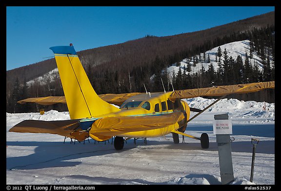 Plane on frozen runway in winter. Chena Hot Springs, Alaska, USA