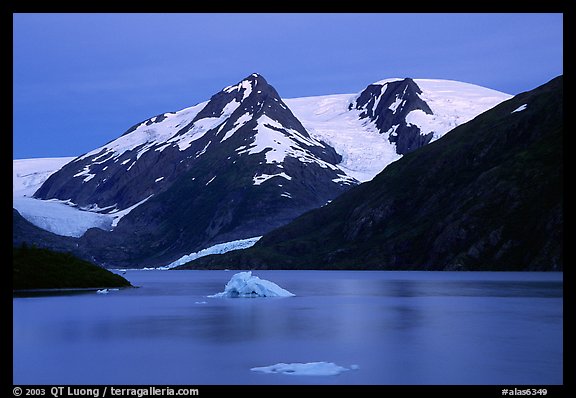Icebergs in Portage Lake at dusk. Alaska, USA