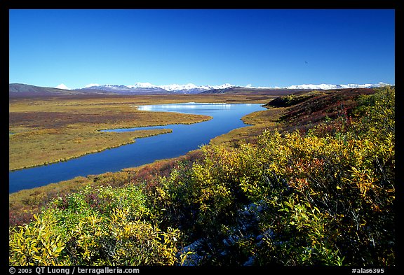 Lake and distant mountain range. Denali Highway, Central Alaska, USA