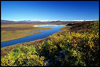 Lake and distant mountain range. Denali Highway, Central Alaska, USA