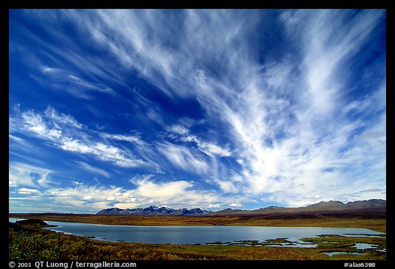 Clouds, tundra and lake along Denali Highway. Alaska, USA