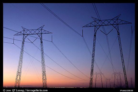 High tension power lines at sunset. California, USA