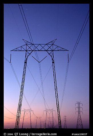 High voltage power lines at sunset. California, USA