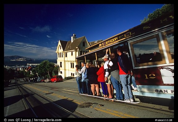 Cable car and Tudor house, Hyde Street, late afternoon. San Francisco, California, USA