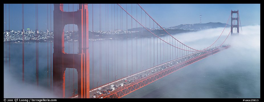 Fog rolling over Golden Gate Bridge. San Francisco, California, USA (color)