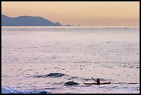 Sea kayaker, Rodeo Beach, sunset. California, USA