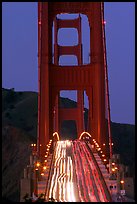 Traffic on Golden Gate Bridge at dusk. San Francisco, California, USA