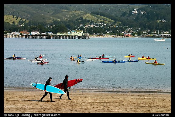 Surfers and sea kayakers, Pillar point harbor. Half Moon Bay, California, USA (color)