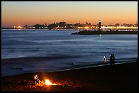 Beach campfire at sunset. Santa Cruz, California, USA