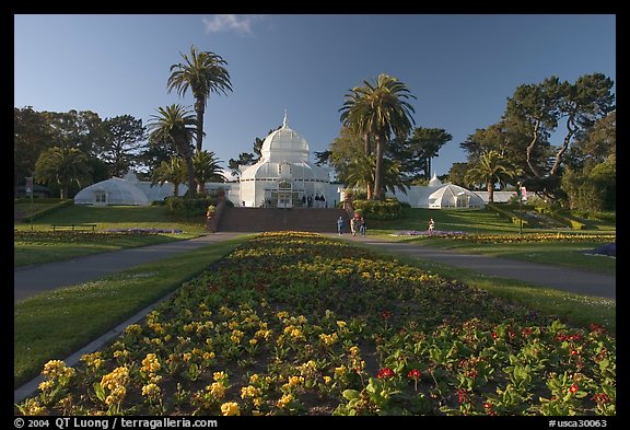 Flower bed and Conservatory of the Flowers, late afternoon, Golden Gate Park. San Francisco, California, USA (color)