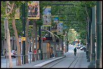 Downtown tree-lined street with tram lane. San Jose, California, USA ( color)