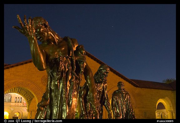 Burghers of Calais sculptures in  Quad at night. Stanford University, California, USA
