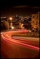 Light trails on the crooked section of Lombard Street at night. San Francisco, California, USA