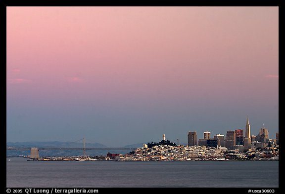 City and Bay Bridge, Sunset. San Francisco, California, USA (color)