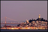 Telegraph Hill and Bay Bridge at dusk. San Francisco, California, USA (color)