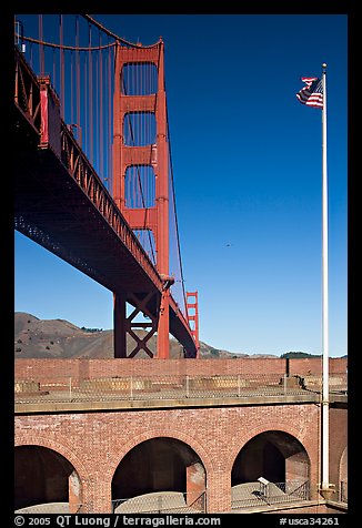 Fort Point courtyard, flag pole, and Golden Gate Bridge. San Francisco, California, USA (color)