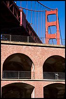 Arched galleries of Fort Point and Golden Gate Bridge pillar. San Francisco, California, USA