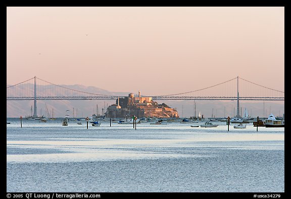 Alcatraz Island and Bay Bridge, sunset. San Francisco, California, USA