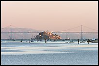 Alcatraz Island and Bay Bridge, sunset. San Francisco, California, USA (color)