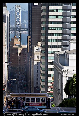 Cable-car, Chinatown, Financial District and Bay Bridge. San Francisco, California, USA (color)