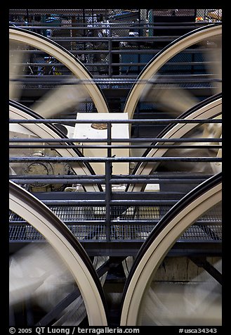 Wheels of cable winding machine in rotation. San Francisco, California, USA (color)