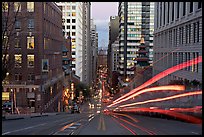 Cable-car rails,  Chinatown, Financial district, and Bay Bridge seen on California street. San Francisco, California, USA ( color)