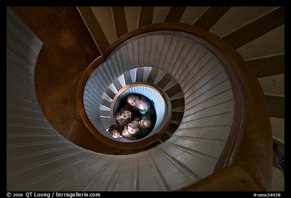 Children standing at the bottom of stairwell, Point Loma Lighthous. San Diego, California, USA