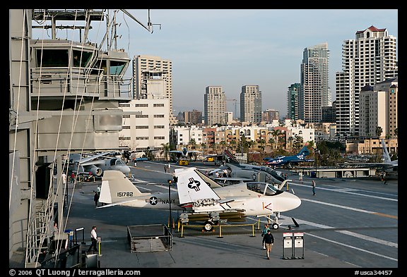 Flight control tower, aircraft, San Diego skyline, USS Midway aircraft carrier. San Diego, California, USA
