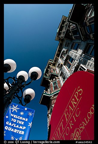 Gaslamp, signs, and facade of the Louis Bank of Commerce, Gaslamp quarter. San Diego, California, USA (color)
