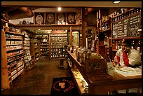 Man at the counter of Tea store,  Old Town. San Diego, California, USA (color)