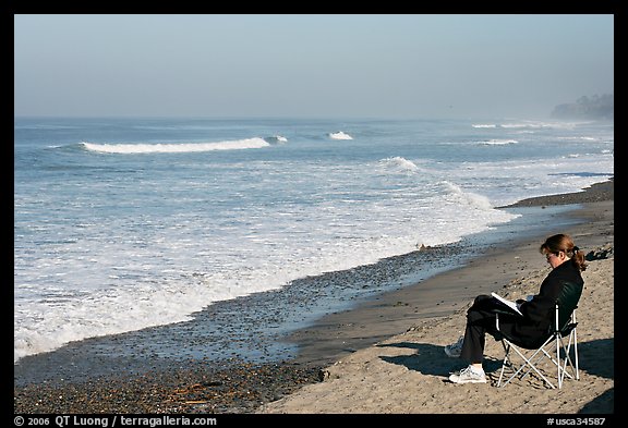 Woman reading on the beach. La Jolla, San Diego, California, USA (color)