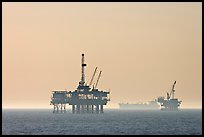 Off-shore drilling platforms and tanker. Huntington Beach, Orange County, California, USA (color)