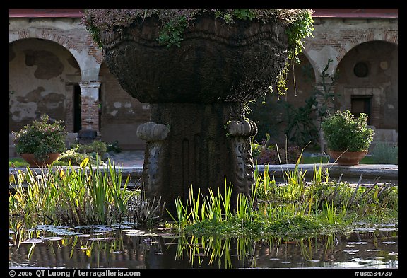 Moorish-style fountain and  courtyard arches. San Juan Capistrano, Orange County, California, USA