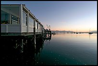 Waterfront restaurant in Morro Bay harbor, sunset. Morro Bay, USA (color)