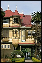 Mansion wing with door opening to a one-story drop. Winchester Mystery House, San Jose, California, USA